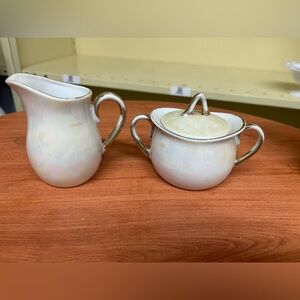 vintage creamer and sugar set featuring a white lustreware finish with gold trim